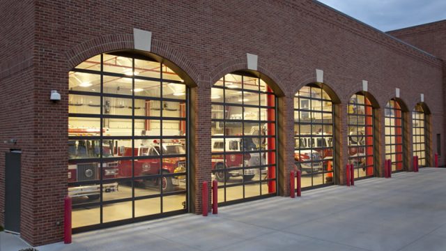 ow of closed glass commercial garage doors at fire house