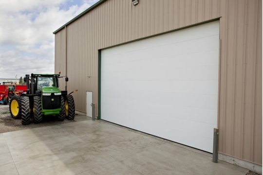 Side view of large white garage door